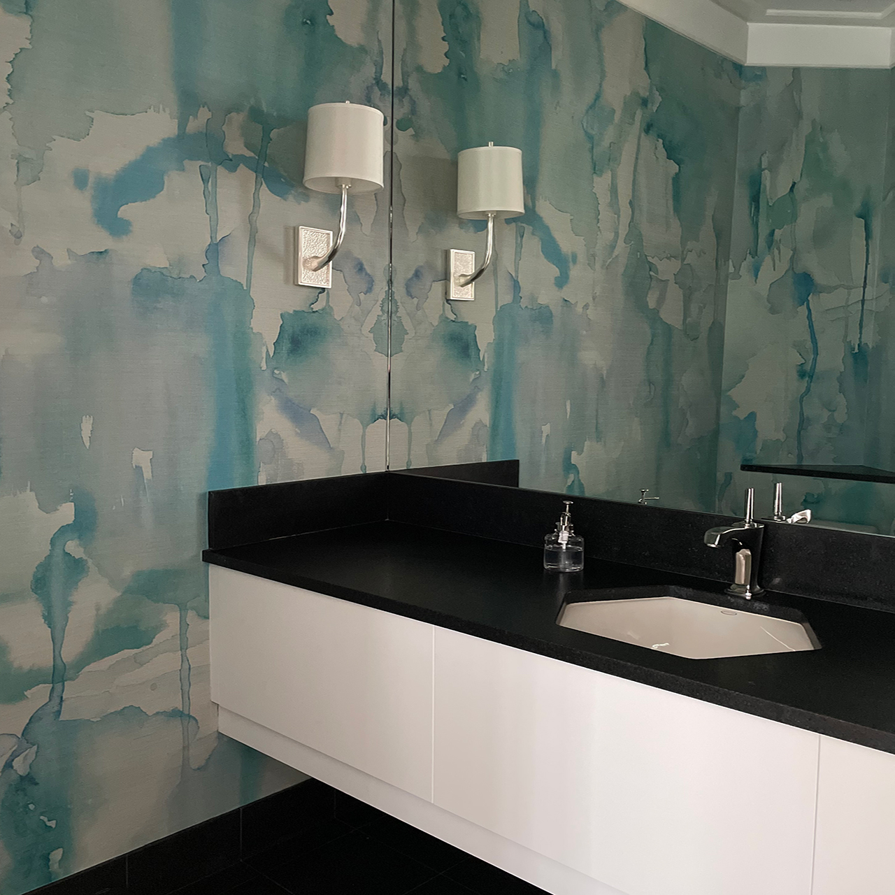 Image of bathroom with blue watercolor wallpaper